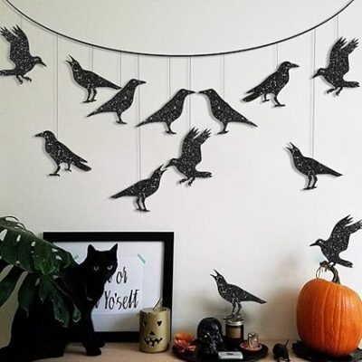 black paper crows on a garland